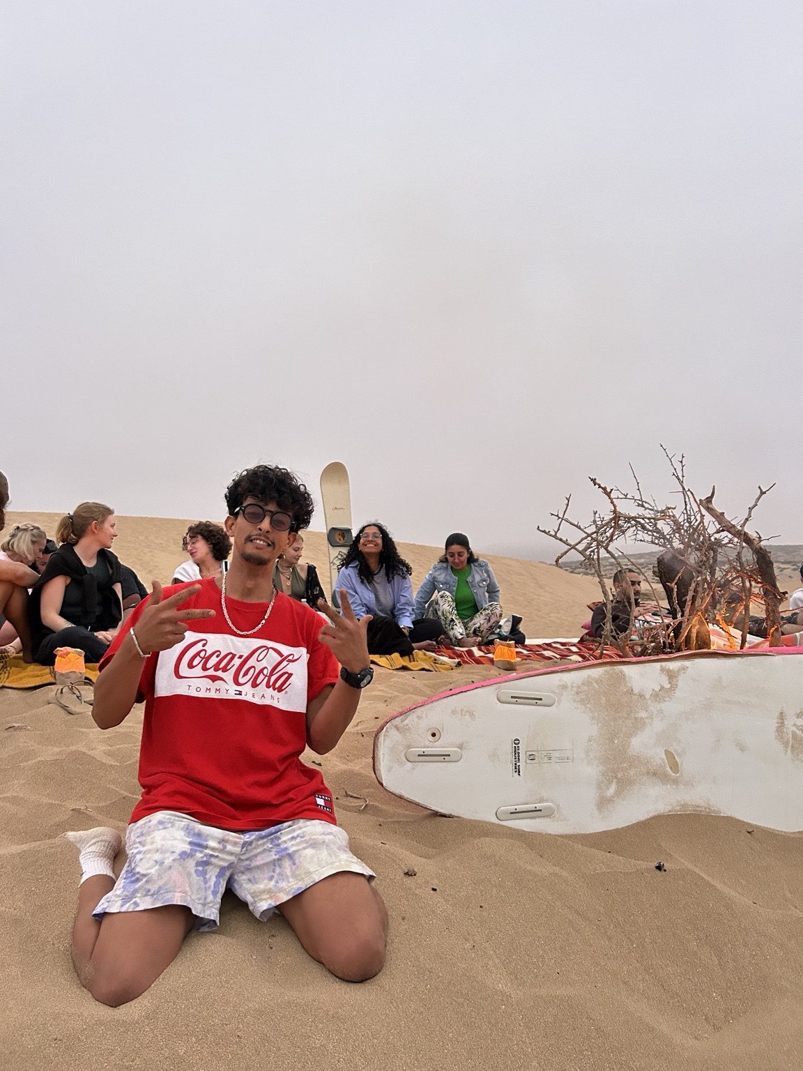 Jamal and a group spending the evening together on the dunes
